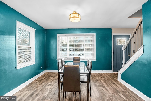 dining area featuring wood-type flooring