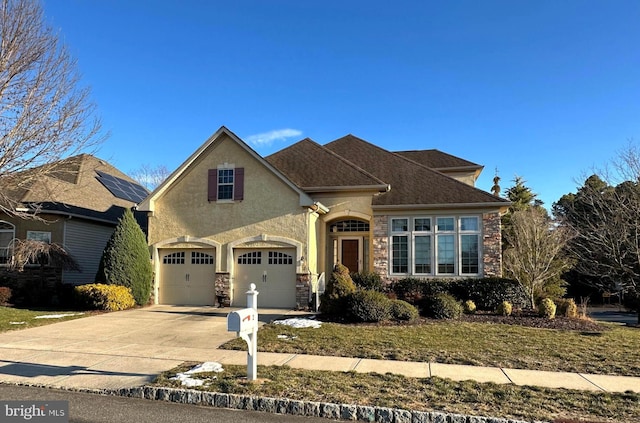 view of front of home with a garage