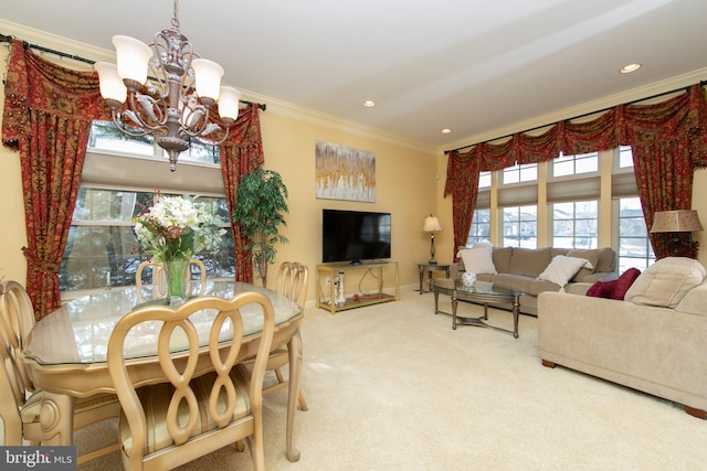 living room featuring crown molding, an inviting chandelier, and carpet floors