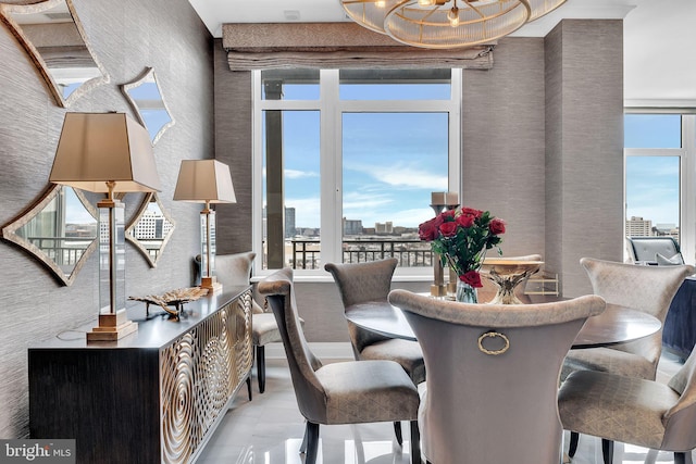 dining space with a chandelier