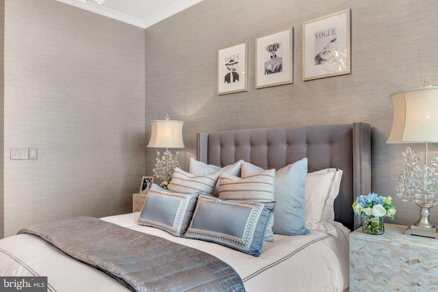 bedroom with ornamental molding