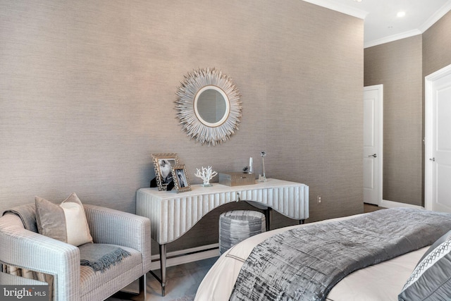 bedroom featuring hardwood / wood-style flooring and crown molding