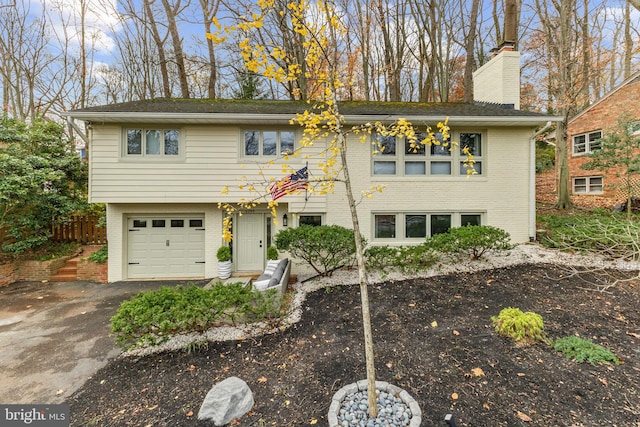 view of front of home with a garage