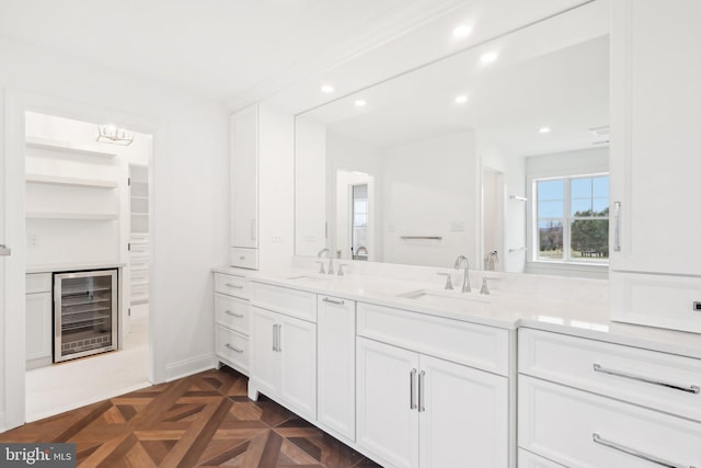 bathroom with vanity, parquet floors, and wine cooler