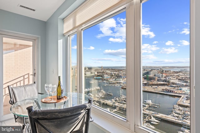 sunroom with a water view