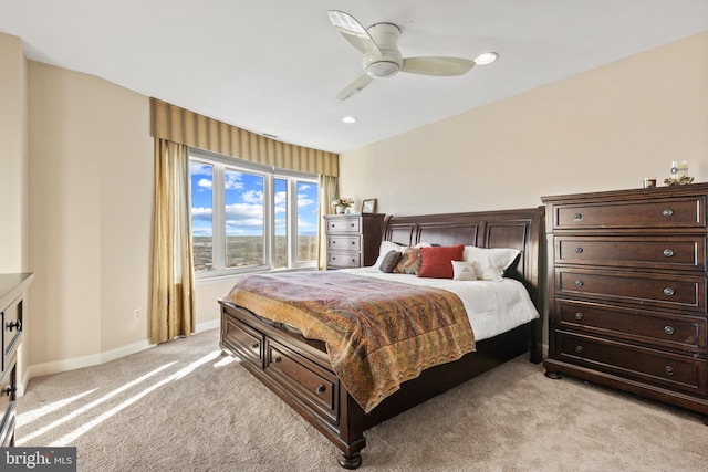 carpeted bedroom featuring ceiling fan