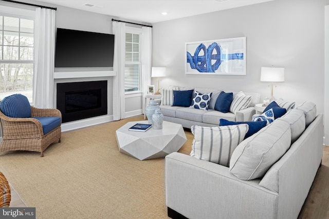 living room featuring plenty of natural light