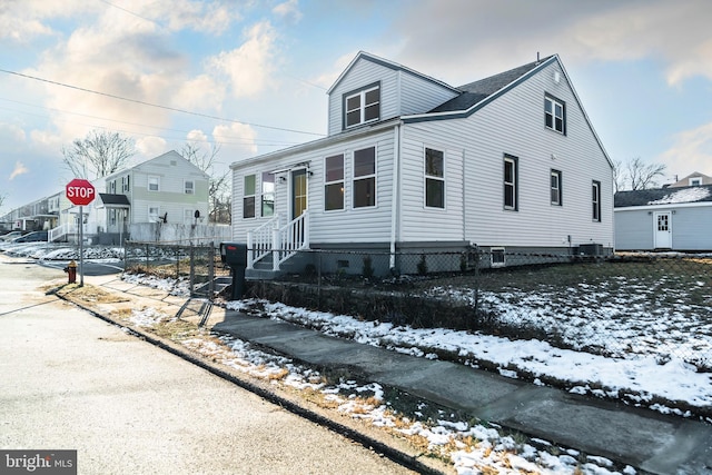 view of front of home with central AC unit