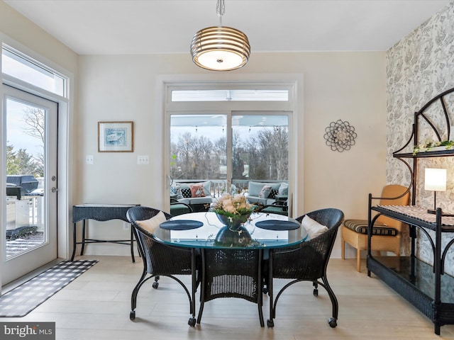 dining room with light wood-type flooring