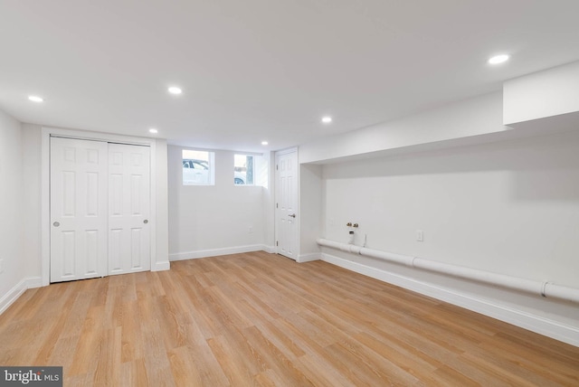 basement with light wood-type flooring