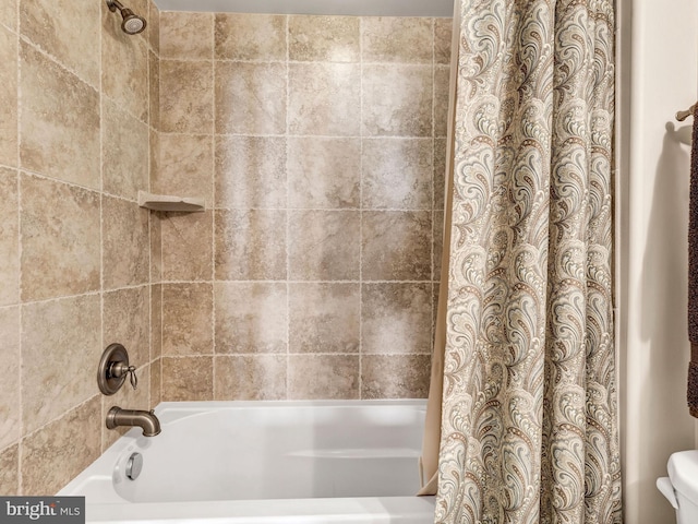 bathroom with toilet and shower / bathtub combination with curtain