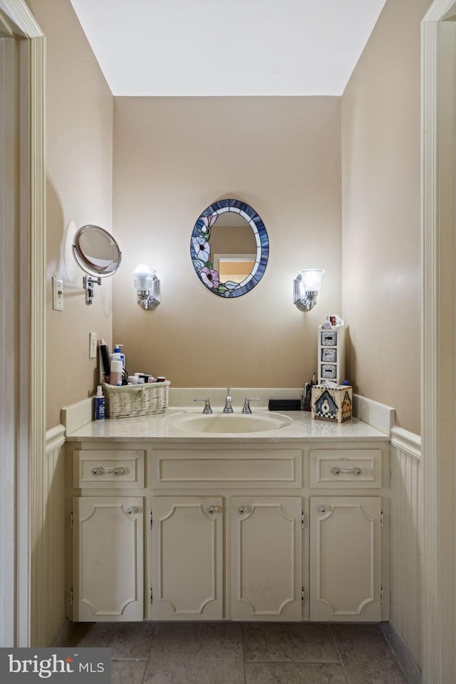 bathroom with vanity and tile patterned flooring