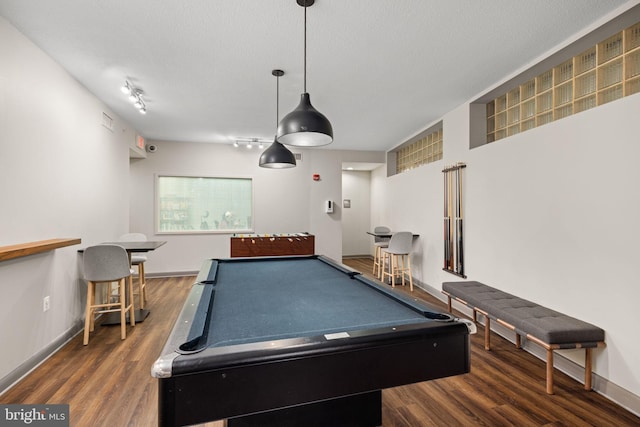 recreation room with dark wood-type flooring, pool table, and rail lighting