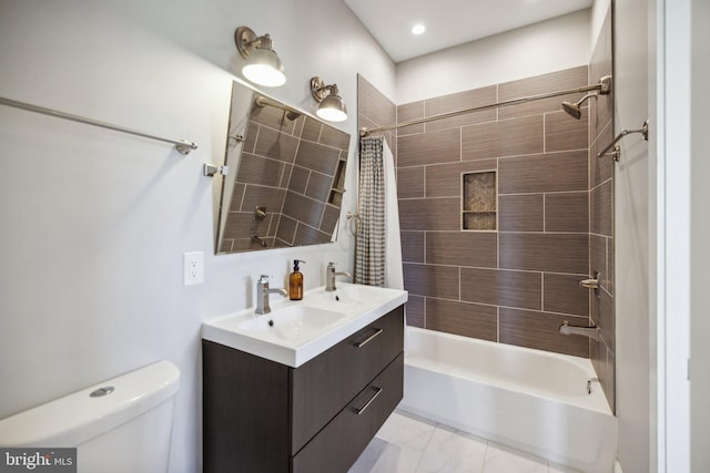 full bathroom featuring toilet, shower / bathtub combination with curtain, and vanity