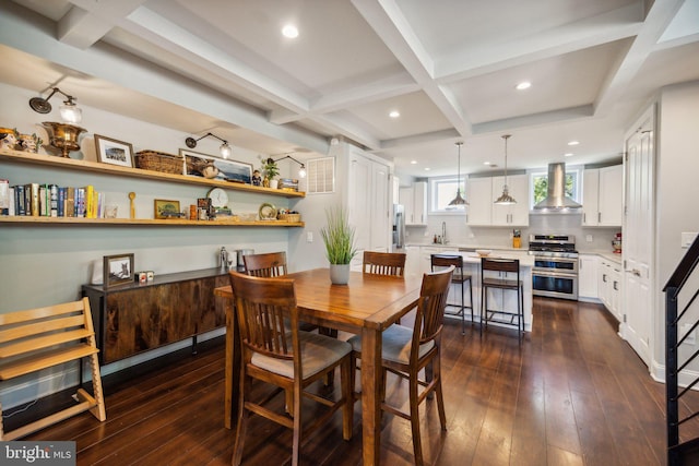 dining area with beam ceiling, dark hardwood / wood-style flooring, and coffered ceiling