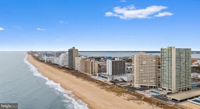 bird's eye view featuring a beach view and a water view