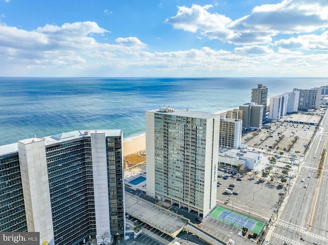 bird's eye view featuring a beach view and a water view