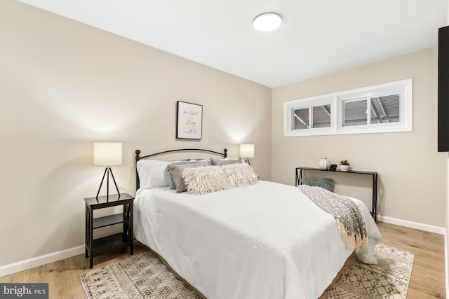 bedroom featuring light wood-type flooring