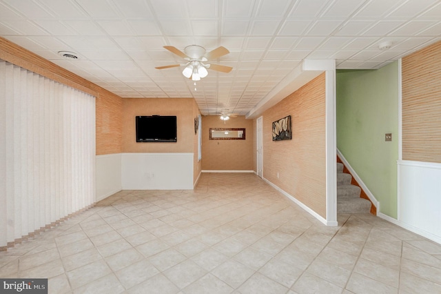 spare room with ceiling fan