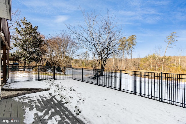 view of yard covered in snow