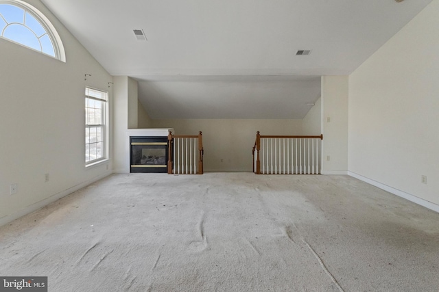 bonus room featuring lofted ceiling