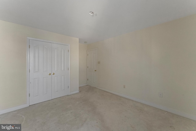 unfurnished bedroom featuring a closet