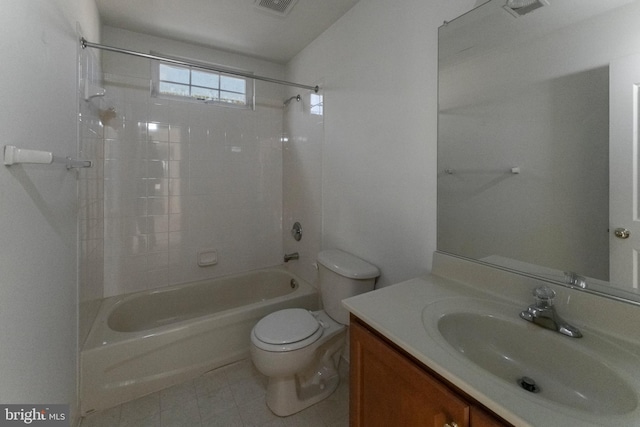 full bathroom featuring toilet, vanity, and tub / shower combination