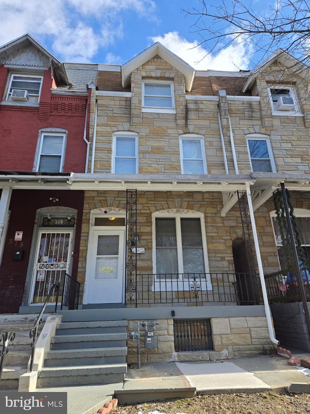 view of property with covered porch