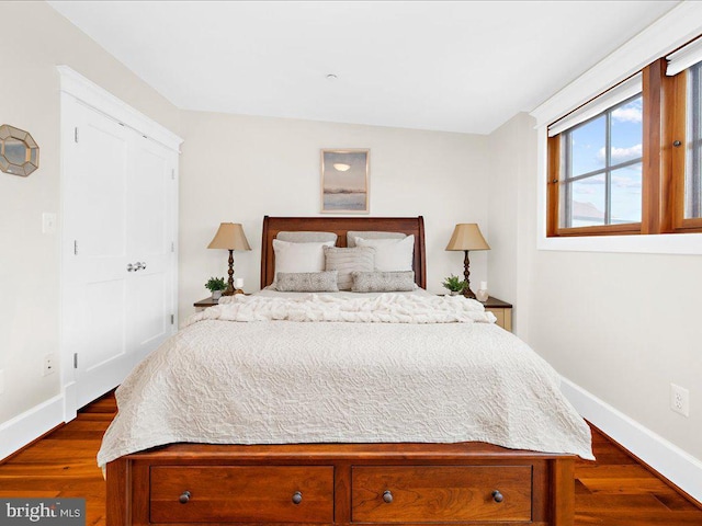 bedroom featuring dark hardwood / wood-style floors