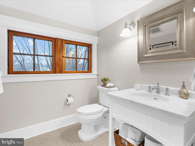 bathroom with tile patterned floors, toilet, and vanity