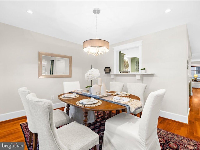 dining room featuring hardwood / wood-style flooring