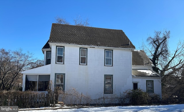 view of snow covered property