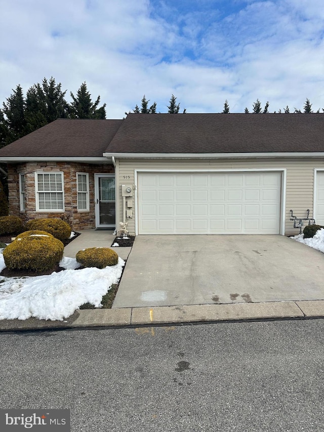 view of front of property with a garage