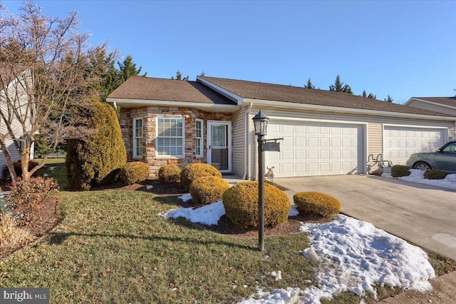 ranch-style home with a front lawn and a garage