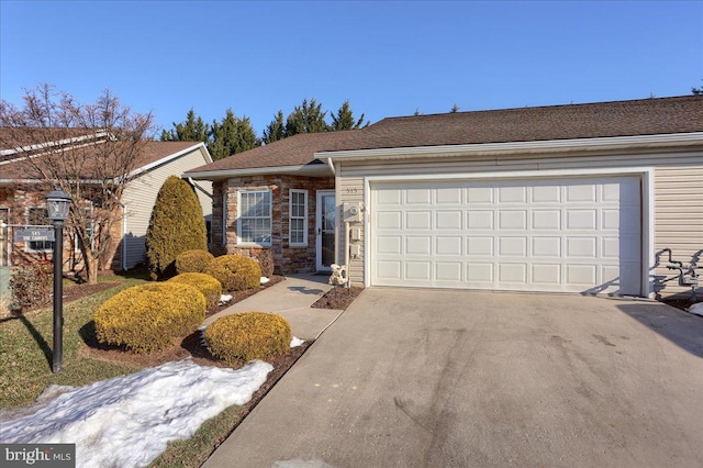 single story home with a garage