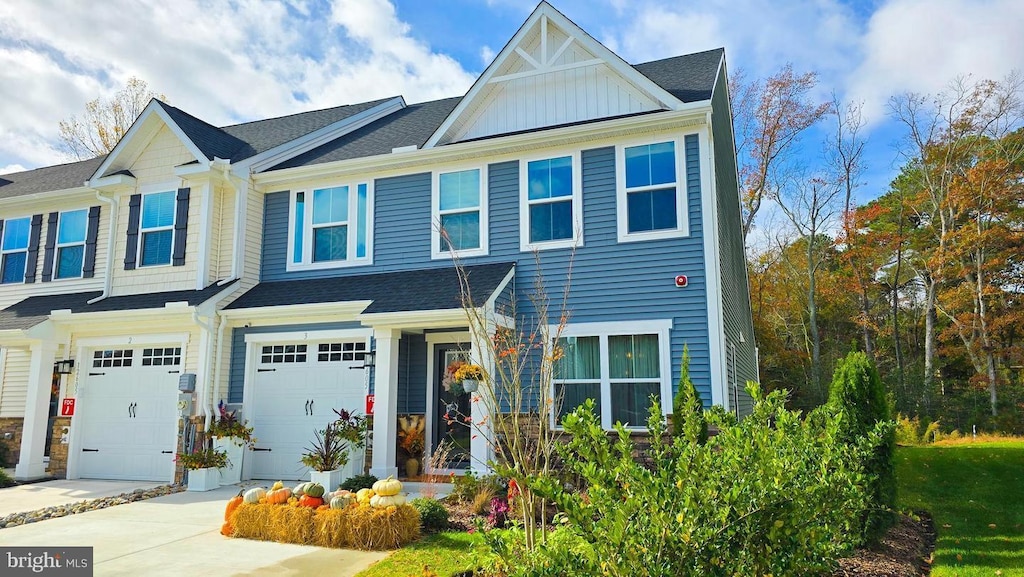 view of front of property with a garage