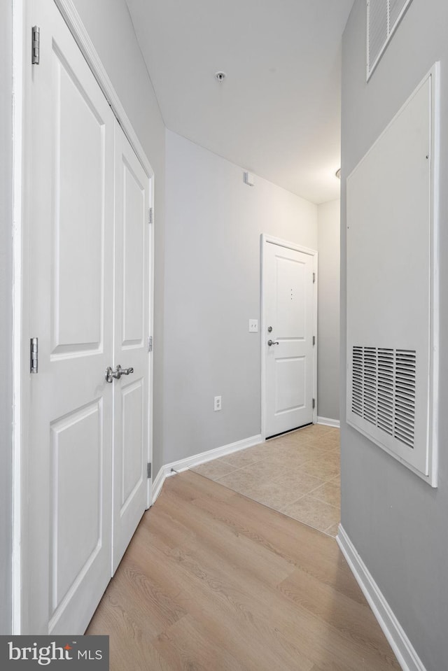 hallway featuring light hardwood / wood-style flooring