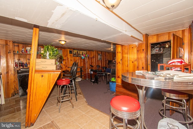 bar featuring wooden walls