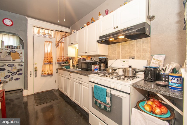 kitchen featuring sink, white cabinetry, decorative backsplash, and white gas range oven