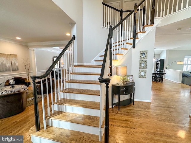 staircase featuring hardwood / wood-style floors