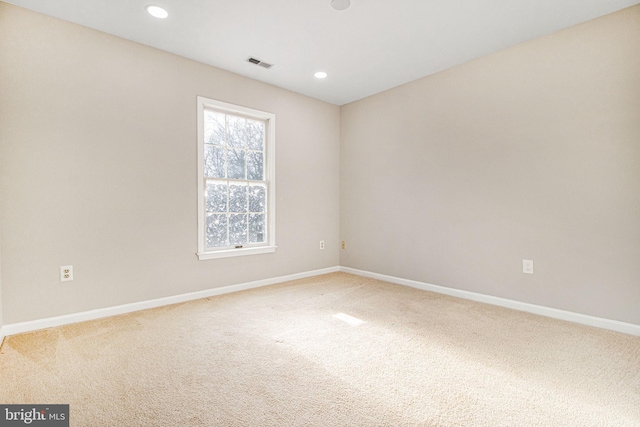 view of carpeted spare room