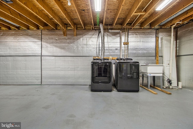 basement featuring separate washer and dryer