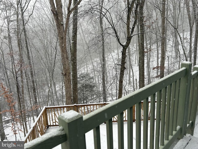 view of snow covered deck