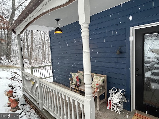 view of snow covered deck