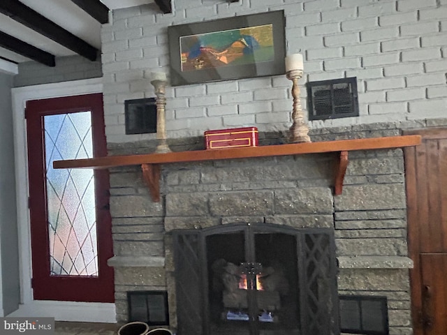 details featuring a stone fireplace