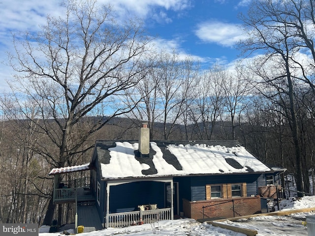 view of snow covered property