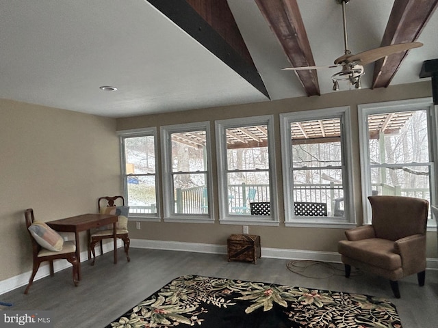 sitting room featuring ceiling fan, beam ceiling, and hardwood / wood-style floors