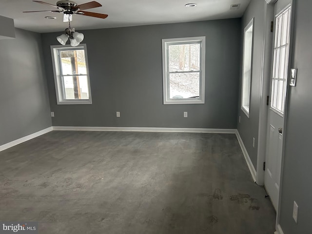 unfurnished room featuring ceiling fan