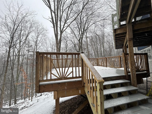 view of snow covered deck