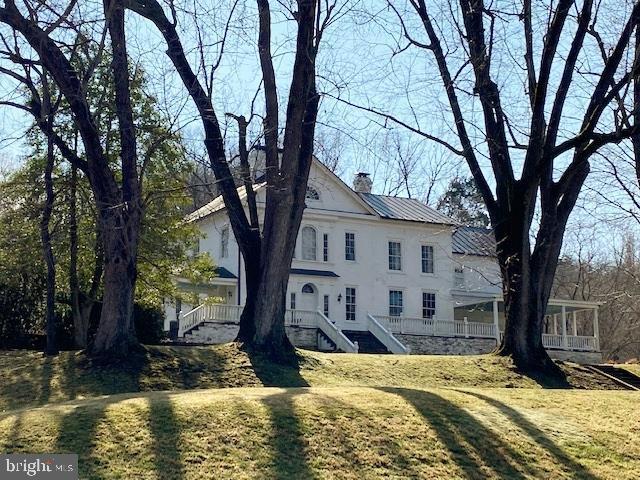 view of home's exterior featuring a lawn